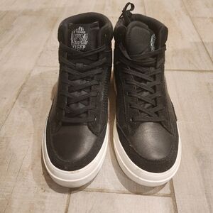 Black hi-top sneakers